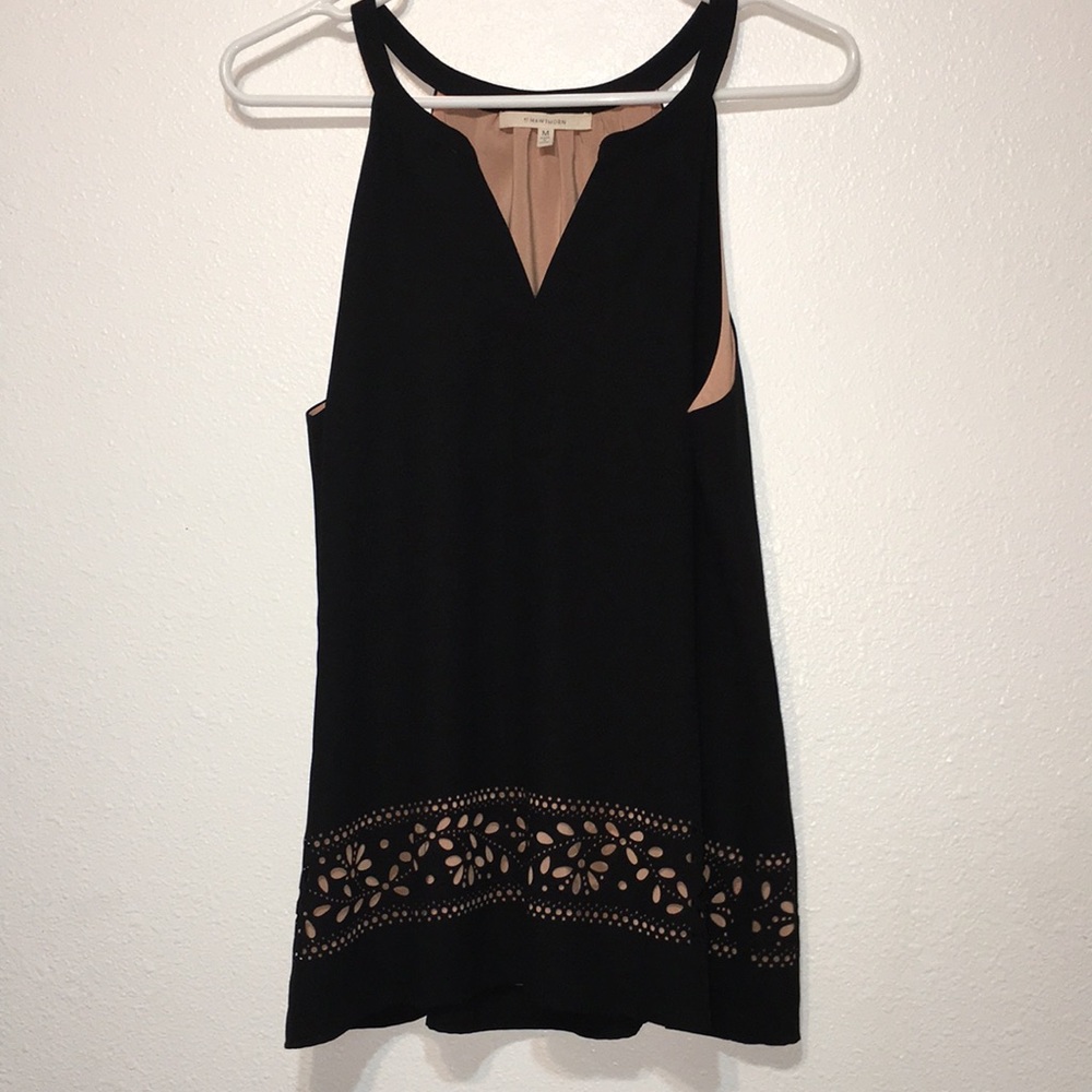Beautiful, classy sleeveless blouse with cutouts
